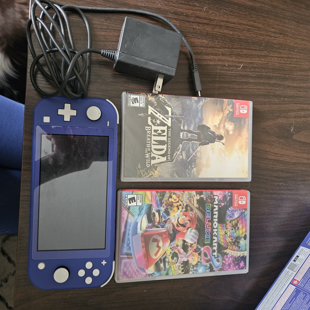 Nintendo Switch Lite Blue Console with Zelda and Mario Kart Games